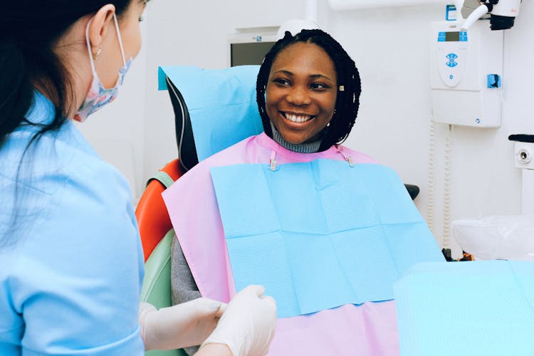 Child smiling during a dental checkup